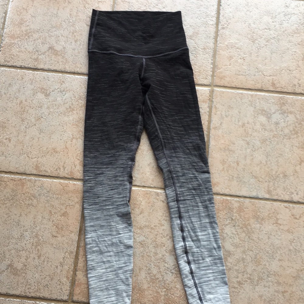 Black and white lululemon leggings, size 4. - Picture 3 of 4